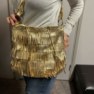 Brand new Cynthia Rowley gold fringed bag !